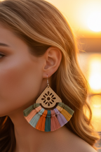 Colorful tassel earrings on a white background