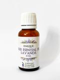 Bottle of Enique lavender essential oil on a white background